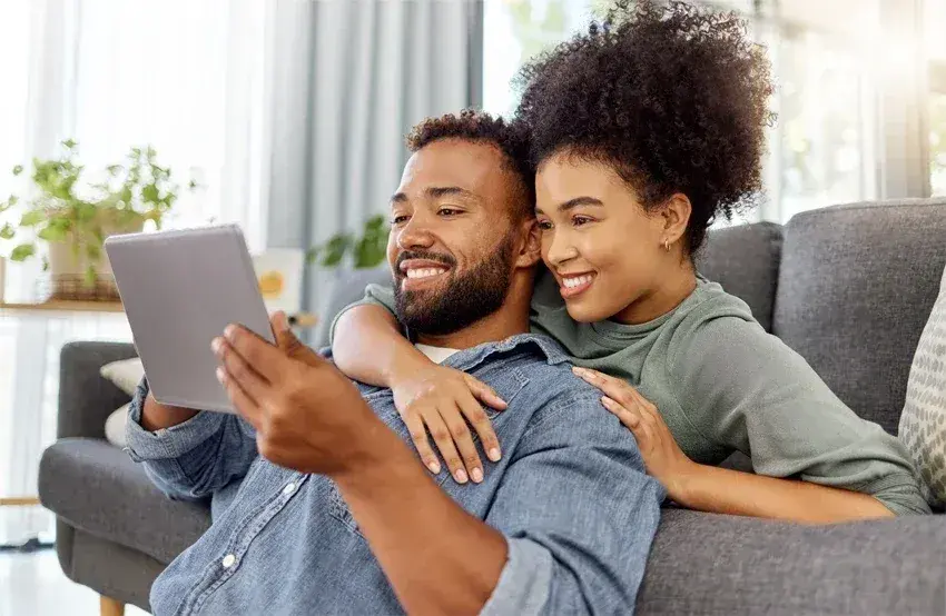 A couple using a tablet together
