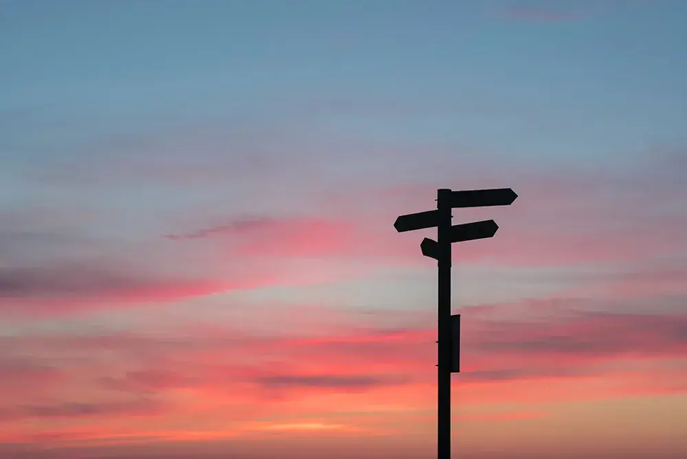 A roadsign in the sunset